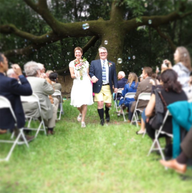 newly-wed taking their first walk as husband and wife