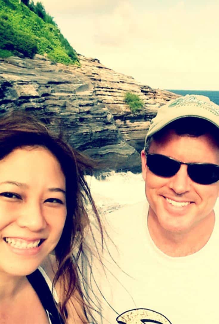 a man wearing a sunglasses with his wife on a vacation