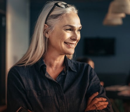 strong successful woman with gray hair smiling