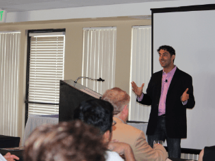 enthusiastic Evan Marc Katz while delivering a speech