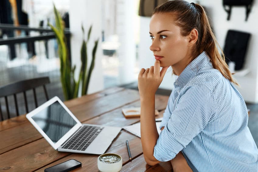 woman thinking of a best way to say no thanks